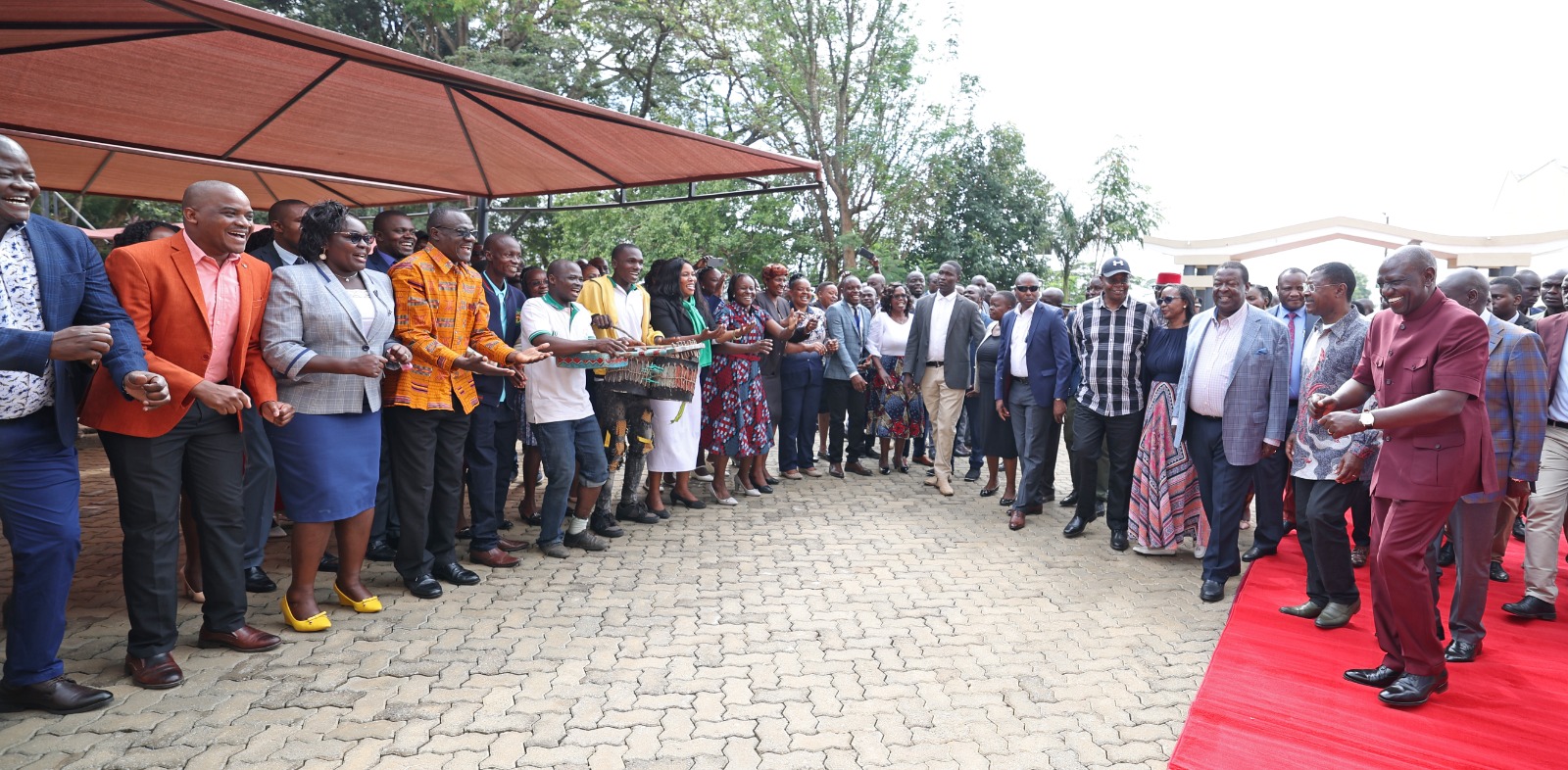 Hon. MCAs and Staff perform a folk song for President William Ruto
